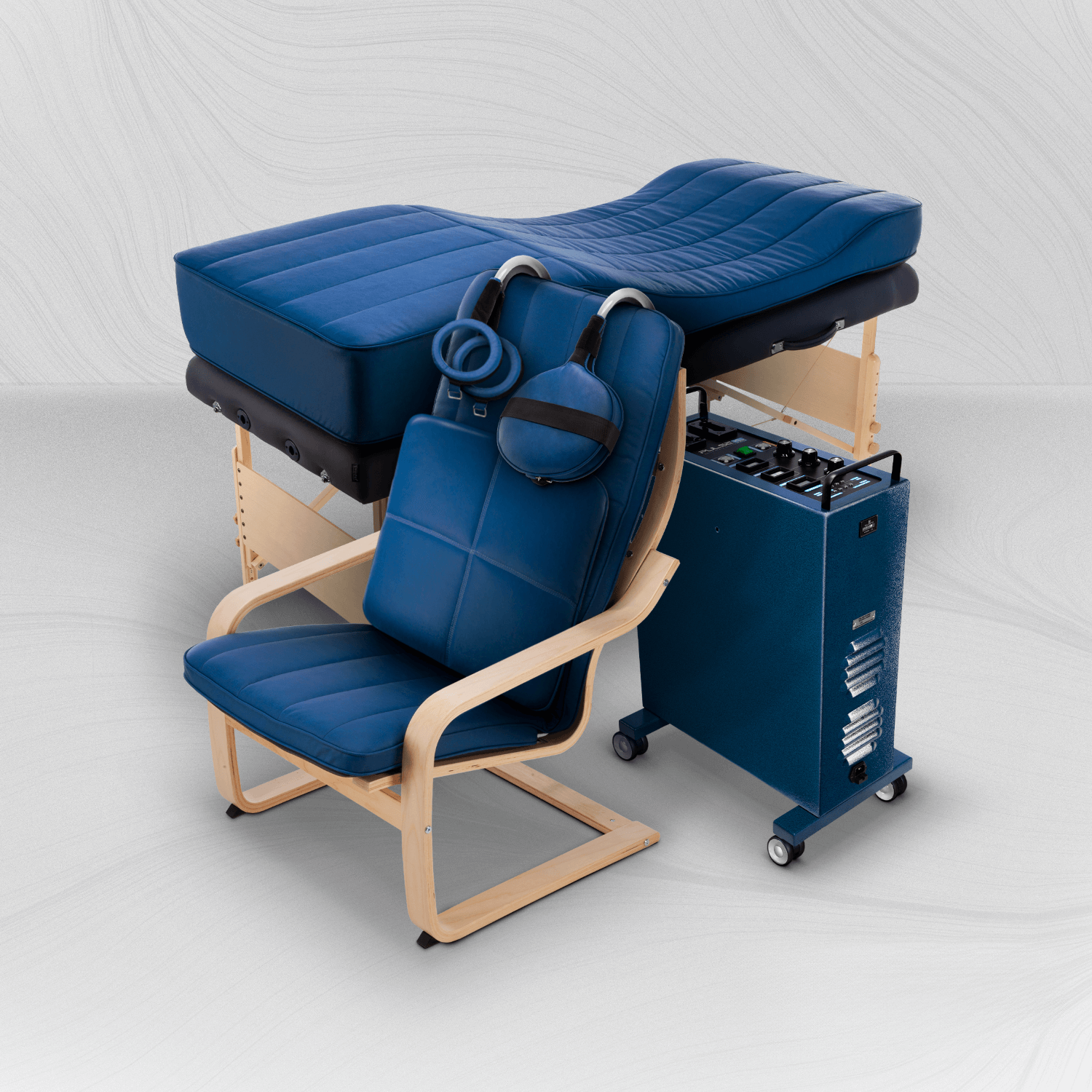 pulse-equipment-partnership-pemf-recovery-2 » PEMF Recovery Plus Blue therapy device on a wooden chair.
