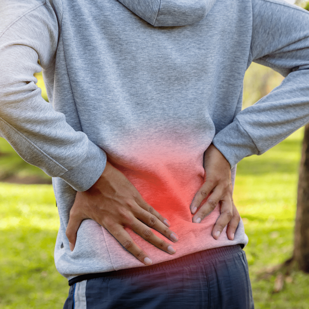 321 » PEMF Recovery Plus man suffering from from back pain while outdoors