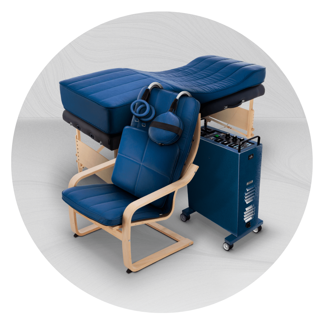 Therapeutic Treatment Chair and Bed Setup » PEMF Recovery Plus Advanced therapy bed and ergonomic medical chair in a clinical setting for pain relief or wellness treatments.