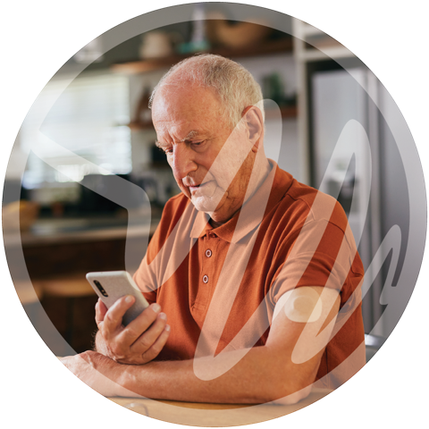 Diabetes Management with Glucose Monitor App » PEMF Recovery Plus Older man using a smartphone to check glucose levels, wearing a diabetes patch.