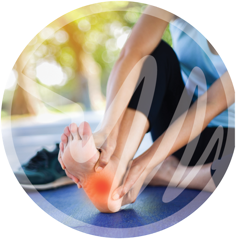 Foot Pain and Plantar Fasciitis Relief » PEMF Recovery Plus Person holding foot with red highlight on heel, indicating foot pain or plantar fasciitis.